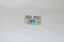 Load image into Gallery viewer, Blue Topaz and Diamond Pave Cylinder Bypass Ring