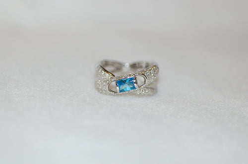 Blue Topaz and Diamond Pave Cylinder Bypass Ring