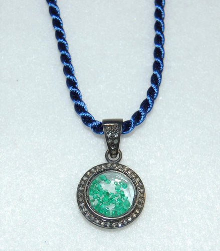 Floating Emerald Pendant