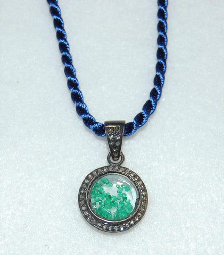 Floating Emerald Pendant