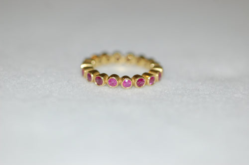 Pink Sapphire Eternity Band